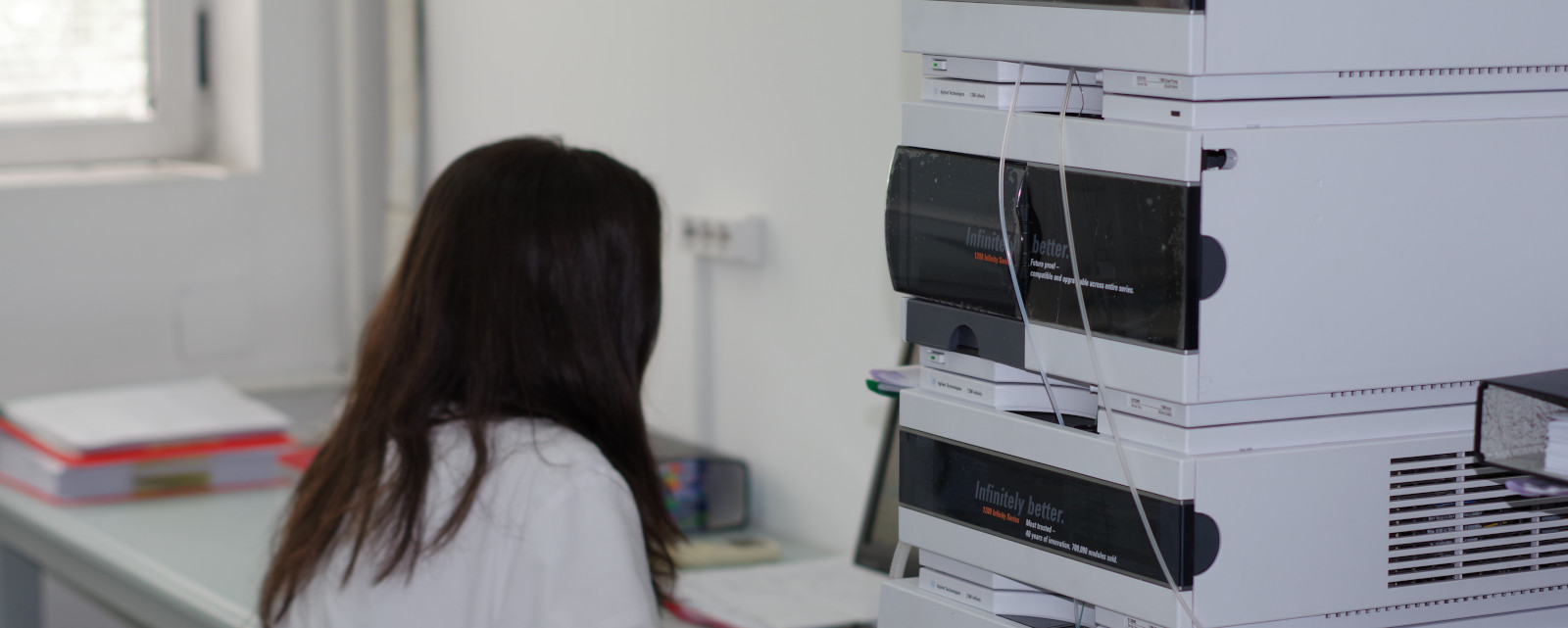 Meditrial laboratory colleague working with chromatography equipment
